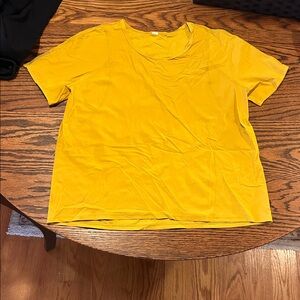 Lululemon gold short sleeve sweat-wicking top med or large see measurements